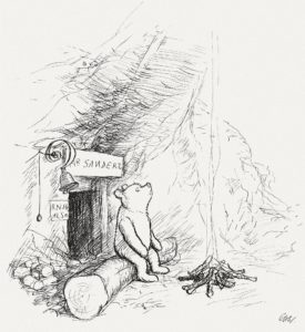 A drawing of Winnie the Pooh sitting on a log next to a a smoldering pile of logs (image courtesy Wikipedia)